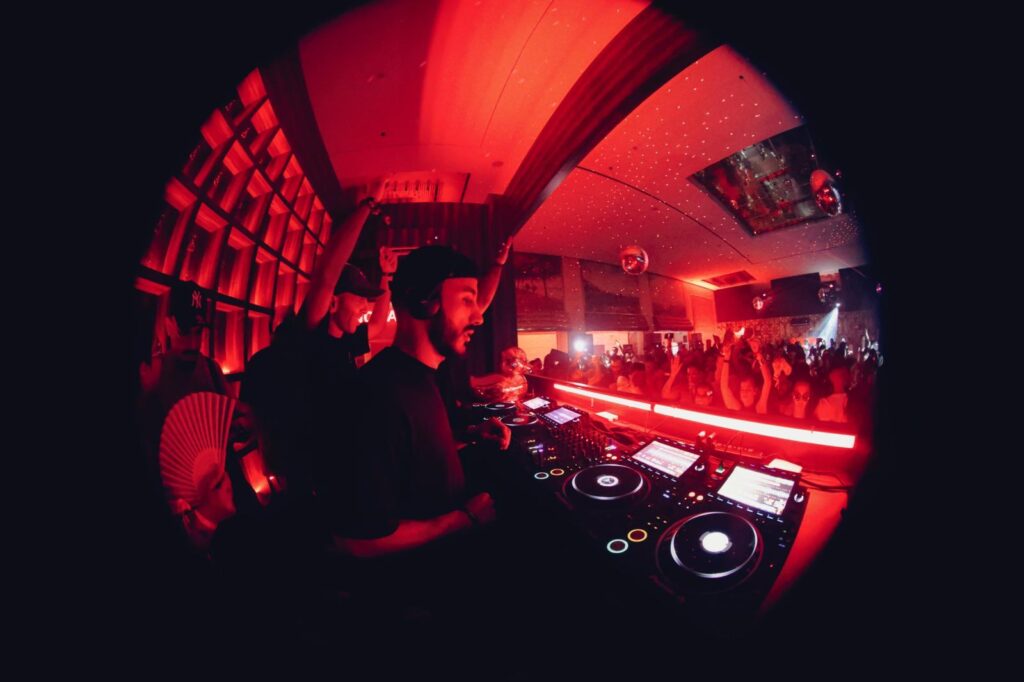 Majid DJ'ing to a crowd